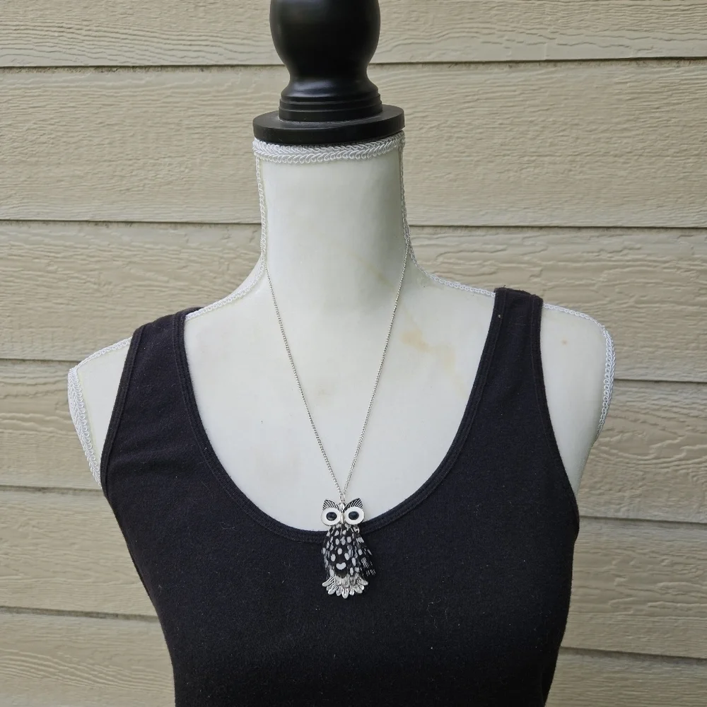 silver tone chain necklace with feathery owl pendant